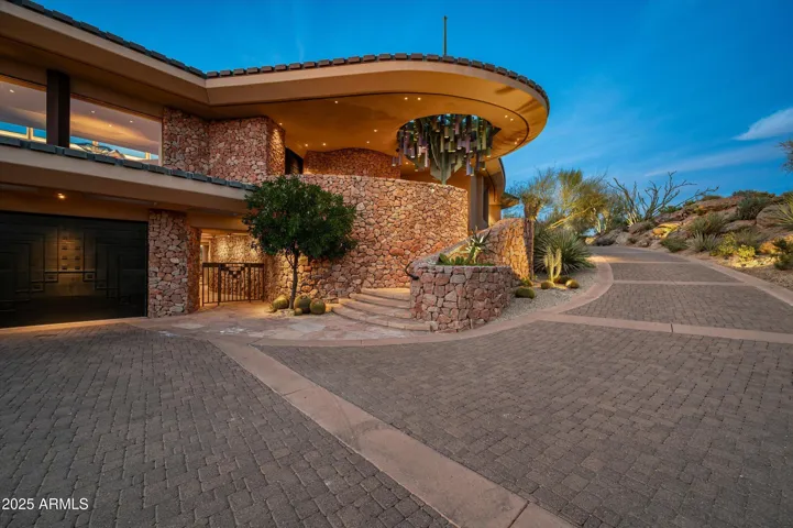 Grand entrance, stacked stone and metal