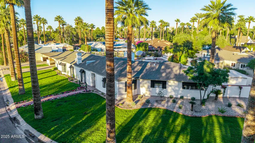This gorgeous lot sits on the corner of the Palmcroft SW "square" and is one of just a very small handful of large single story homes on lots this large.