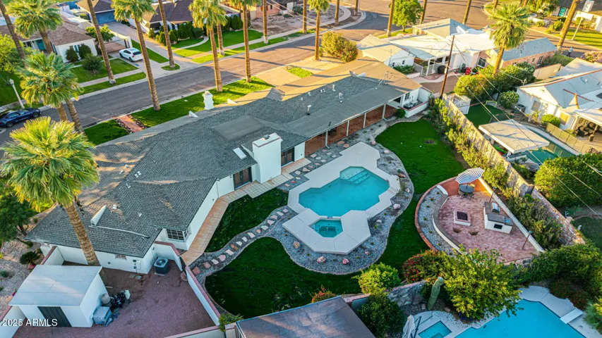 A portion of the lot--visible to the left of this photo--shows an enclosed section of the yard that houses a permanent storage shed, pool equipment, and room to store whatever you'd like.
