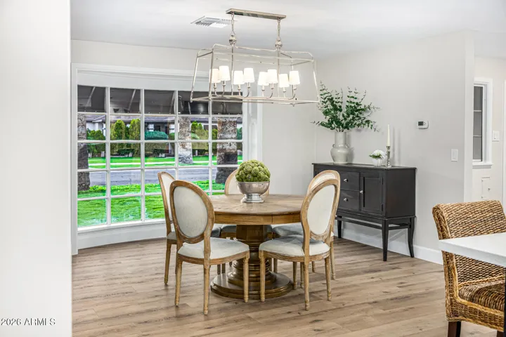 This dramatic bay window is one of the original features of the home that adds character and beauty.