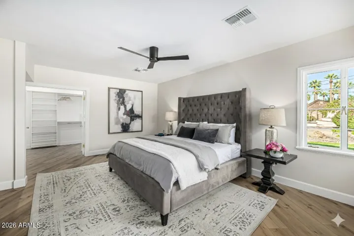 The Primary Bedroom is extra spacious with room for a king bed, nightstands, and dressers.