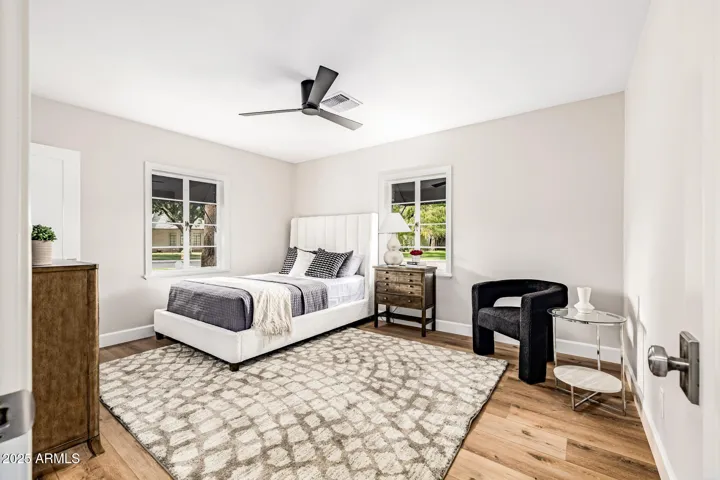 Bedroom two features gorgeous natural light and a walk-in closet