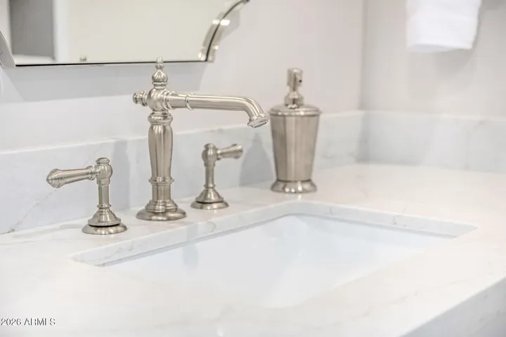 It's the thoughtful details that make this home shine. Carefully curated fixtures reflect the aesthetic of the era this home was constructed.