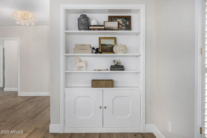 An original built-in bookcase adds charm and style to the sitting room.