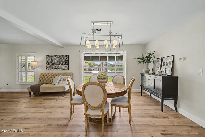 The spacious dining room can easily accomodate 6-12 people!