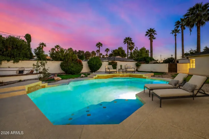 The pool and spa have decking for chaise lounges and chairs. Perfect for pool parties!