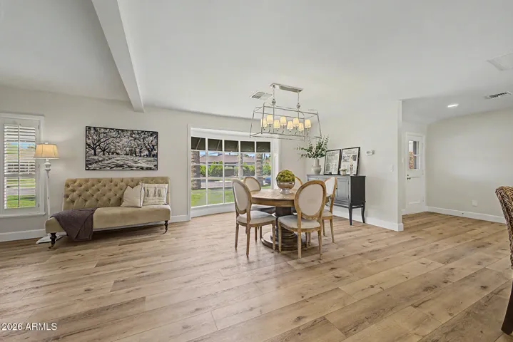 There's a second entrance next to the dining room and kitchen that's a perfect drop space for keys, phones, and purses.