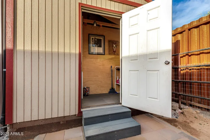 Bathroom attached to feed shed with motion sensor lights