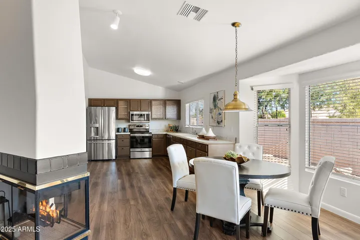 EAT-IN KITCEN AND LUXURY VINYL FLOORING THROUGHOUT MOST OF THE HOME.