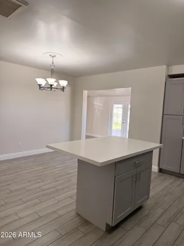 Kitchen from the hall showing dinning area