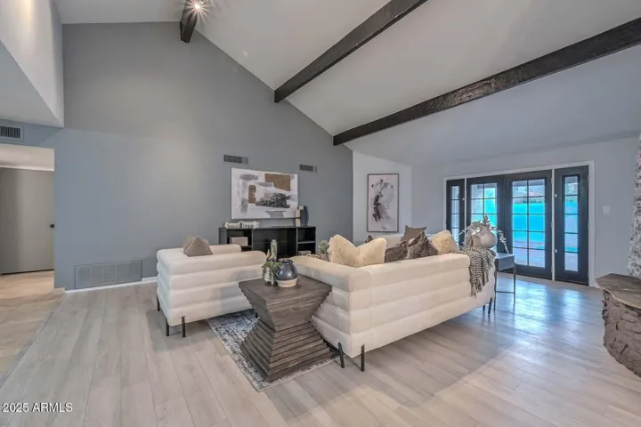 Vaulted beamed ceilings in great room