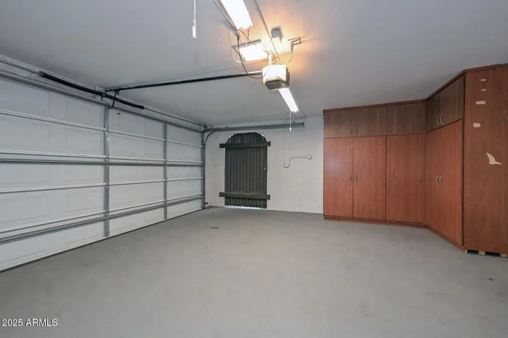 2-car garage with cabinets