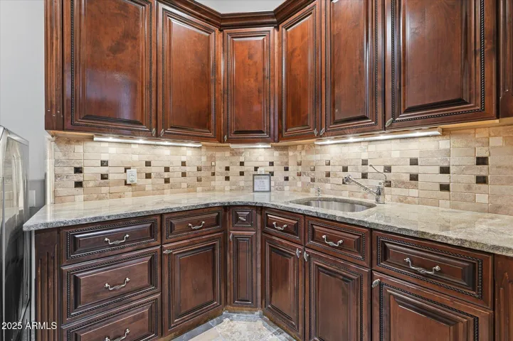 Laundry room with tons of cabinets