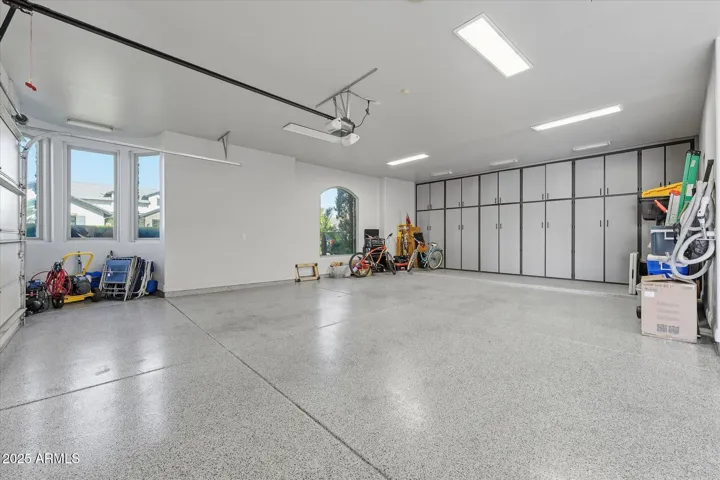 6 car garage 4 tandon 2 car extra deep with tons cabinets and epoxy flooring and work bench