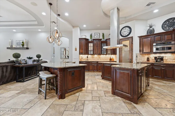 Chefs kitchen with double islands