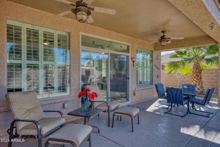 Beautiful extended covered patio w cool deck coating. Perfect for relaxing in private walled backyard