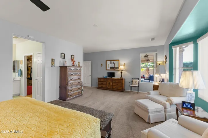 Primary bedroom from right corner of bed area