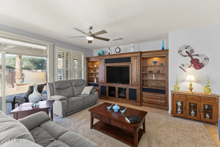 Great Room from breakfast bar reflecting large custom wall unit