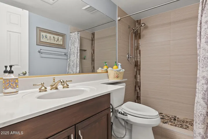 Walk in shower with tile detail