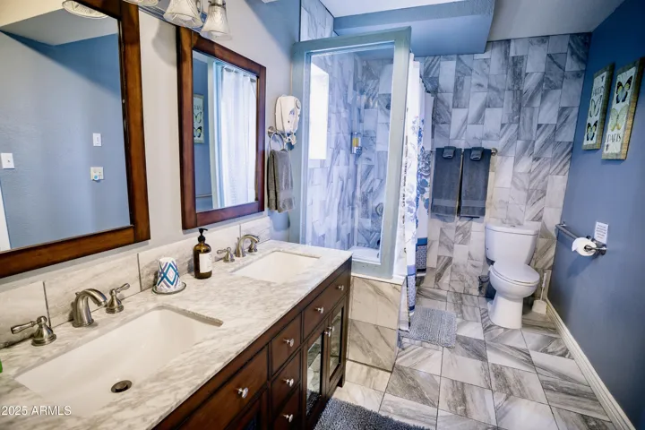 Double Sinks, Gorgeous Tile Work, Tub/Shower Combo