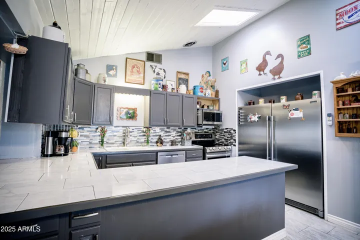 Commercial Size Refrigerator, Custom Backsplash, Non Laminate Countertops