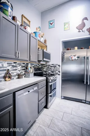 Commercial Size Refrigerator, Custom Backsplash, Non Laminate Countertops