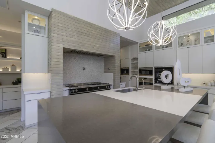oversized kitchen island with waterfall edges