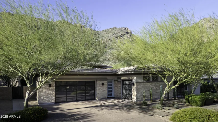 Single level home with 3 car garage. Garages with built-in cabinets