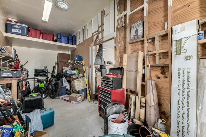 this is at the back of the garage-workshop area with a separate entrance. there is an A/C unit out here.