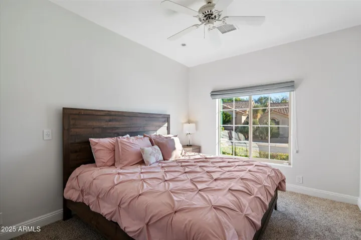 3rd bedroom the pink room with King size bed with TV 65 inch on the wall