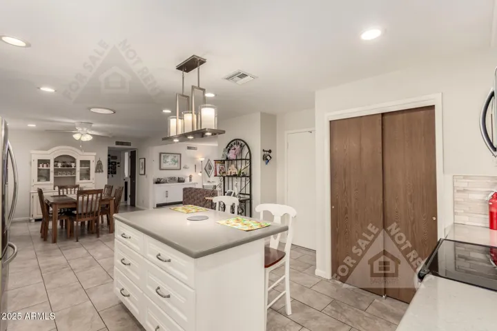 Island for kitchen convenience and storage