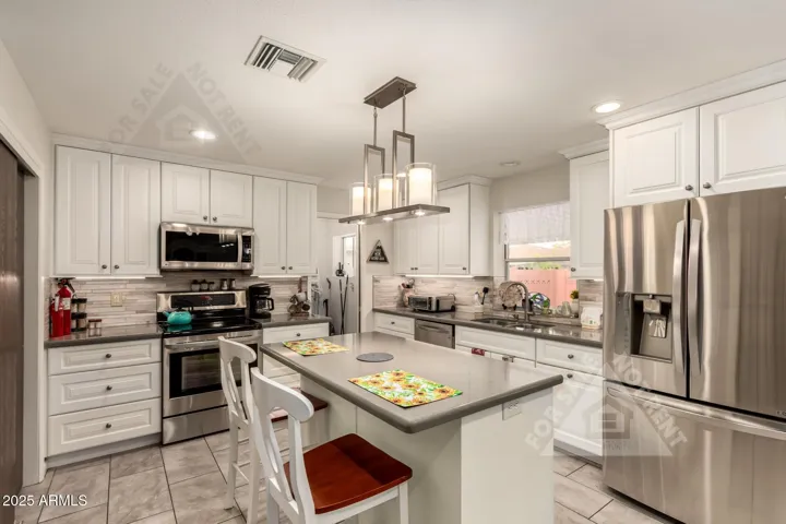 Stainless appliances. Frig included!