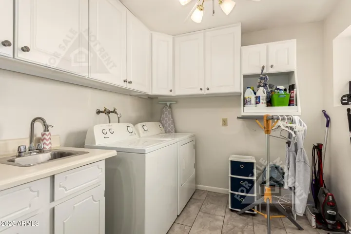 Huge laundry room, lots of storage, Washer & Dryer included.