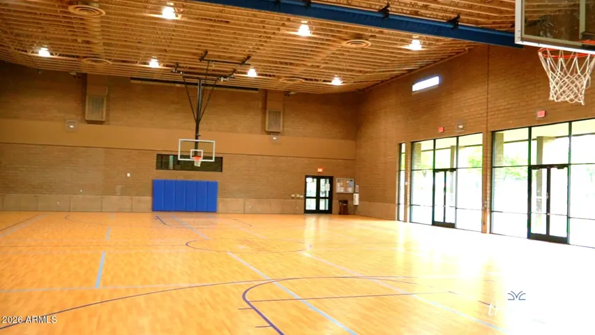 Spacious indoor basketball court within the Peoria community, offering year-round fitness and recreational opportunities in a well-maintained facility.