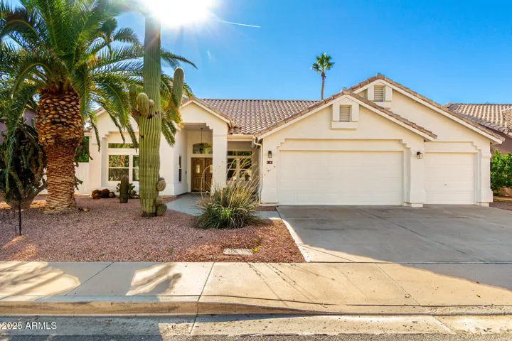 Bright curb appeal welcomes you to this remodeled Scottsdale home, featuring fresh exterior finishes, desert landscaping, and a clean modern look that highlights pride of ownership.