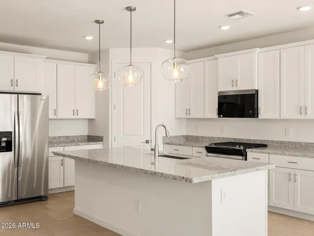 Photo is not of the actual home. Interior finishes and fixtures may vary