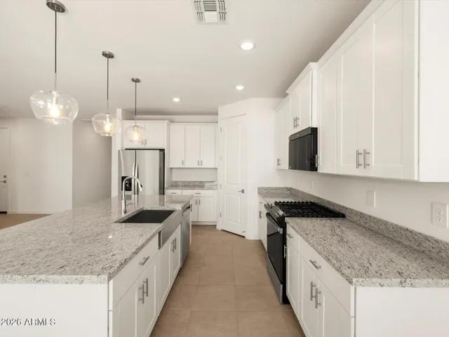 Photo is not of the actual home. Interior finishes and fixtures may vary
