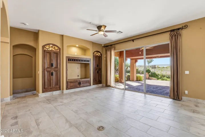 Tile flooring flows throughout enhancing the cohesive design and bright, airy atmosphere.