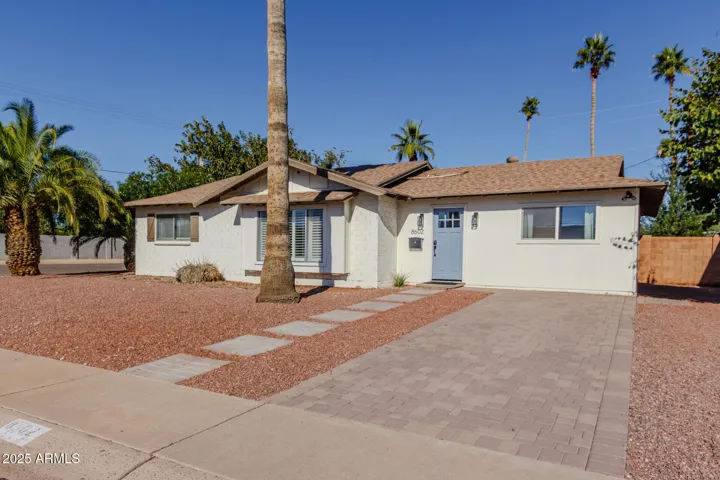 FRONT ELEVATION WITH PAVER PARKING AREA