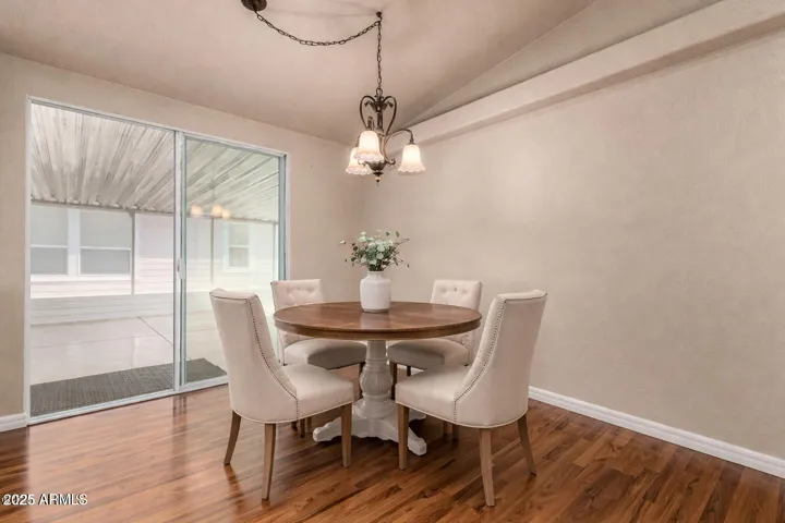 Virtually staged with AI (eat-in kitchen)