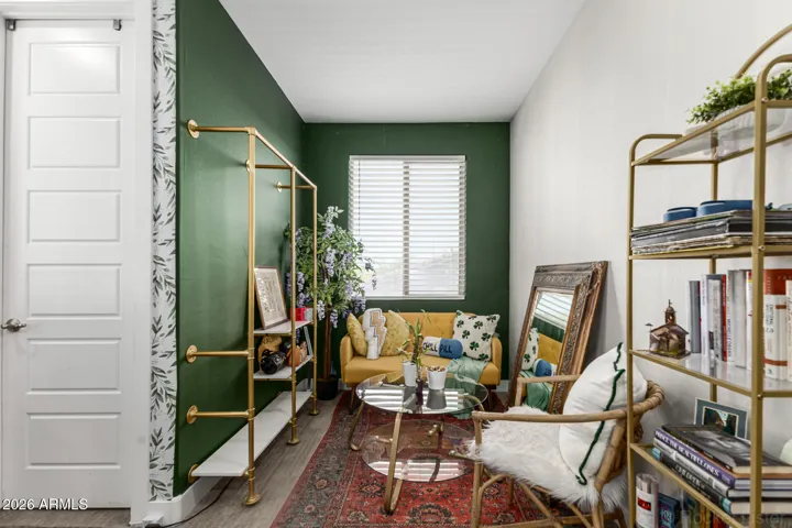 Sitting room area and private exit to back balcony.