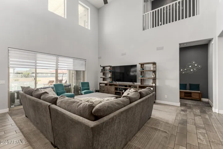 Sliding doors open to back patio/pool