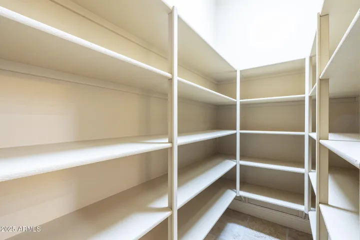 Walk in pantry with storage for all your needs.