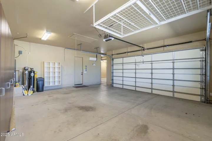 The 2 car door bay features overhead storage as well as conditioned space via mini-split HVAC.