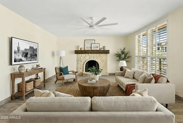 Living room with gas fireplace (virtually staged)
