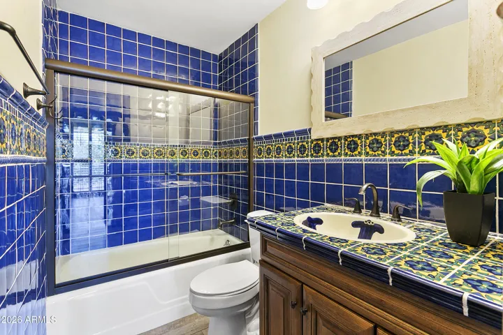 Bathroom 2 with colorful handmade tile and full tub