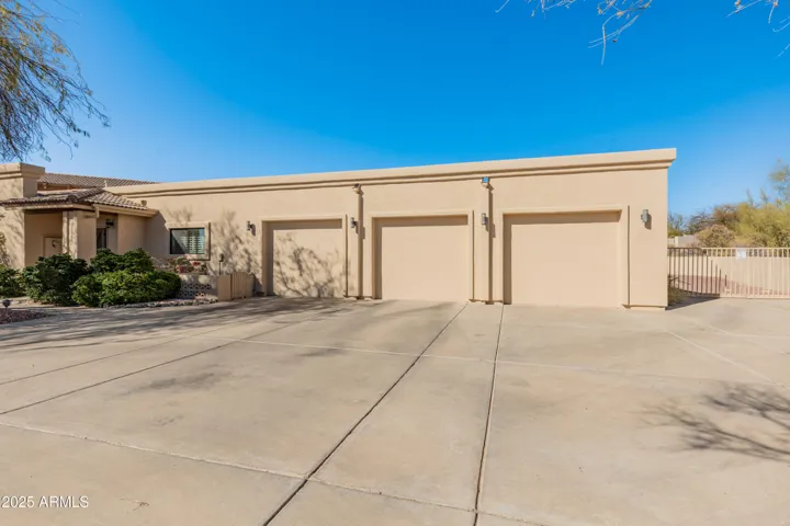 Three car garage with three separate bay doors
