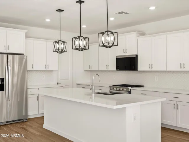 Photo is not of the actual home. Interior finishes and fixtures may vary