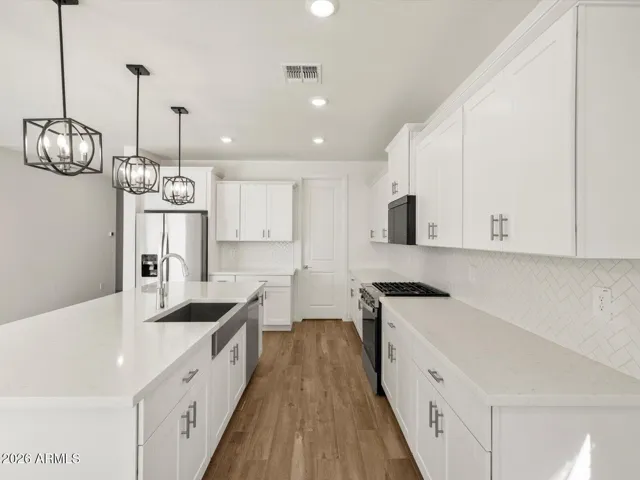 Photo is not of the actual home. Interior finishes and fixtures may vary