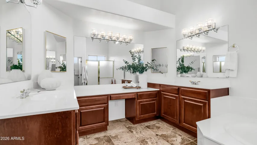 Dual Vanities With Custom Cabinetry